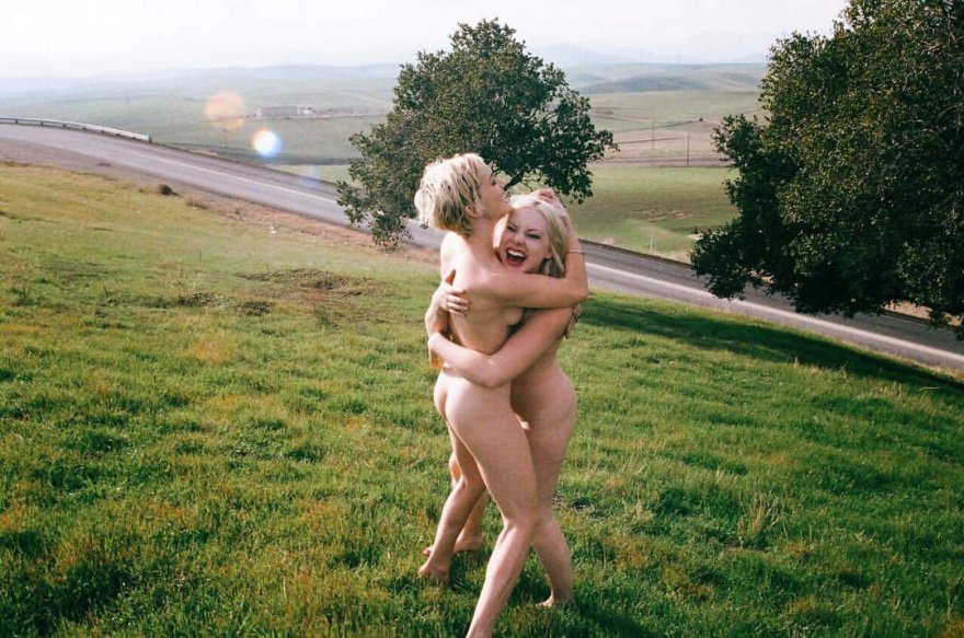 Blonde, naked and happy