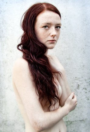 zdjęcie amatorskie Freckled Pale Redhead with Green Eyes