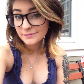 Glasses, tattoo, nose ring, freckles. Love hipsters