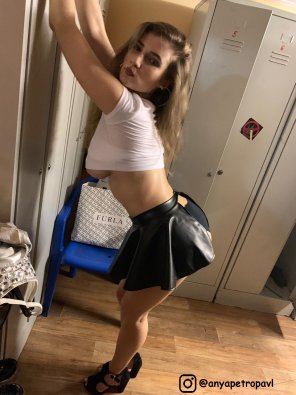 photo amateur Sexy Russian girl. Bent over showing boobies in the locker room!
