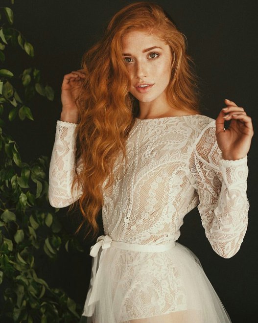 Beautiful redhead in lace dress
