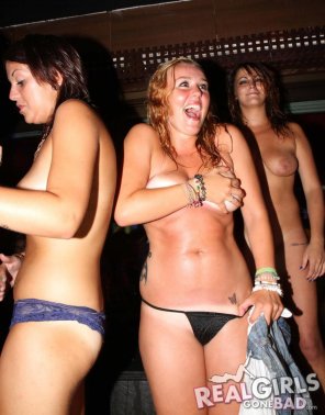 Happy and Embarrassed in a Handbra while her friends think it's no biggie