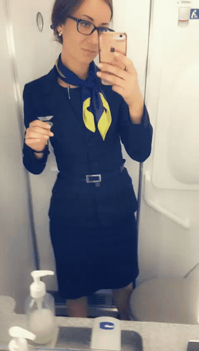 photo amateur Flight attendant in the toilet.