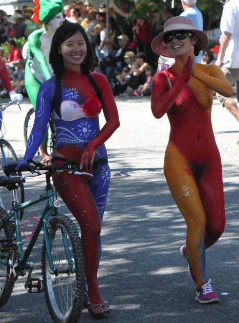 She looks embarrassed just to be in a bikini. Her friend...not so much...