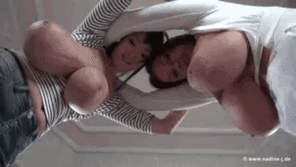 amateur photo Hitomi and Nadine swinging their heavy hangers
