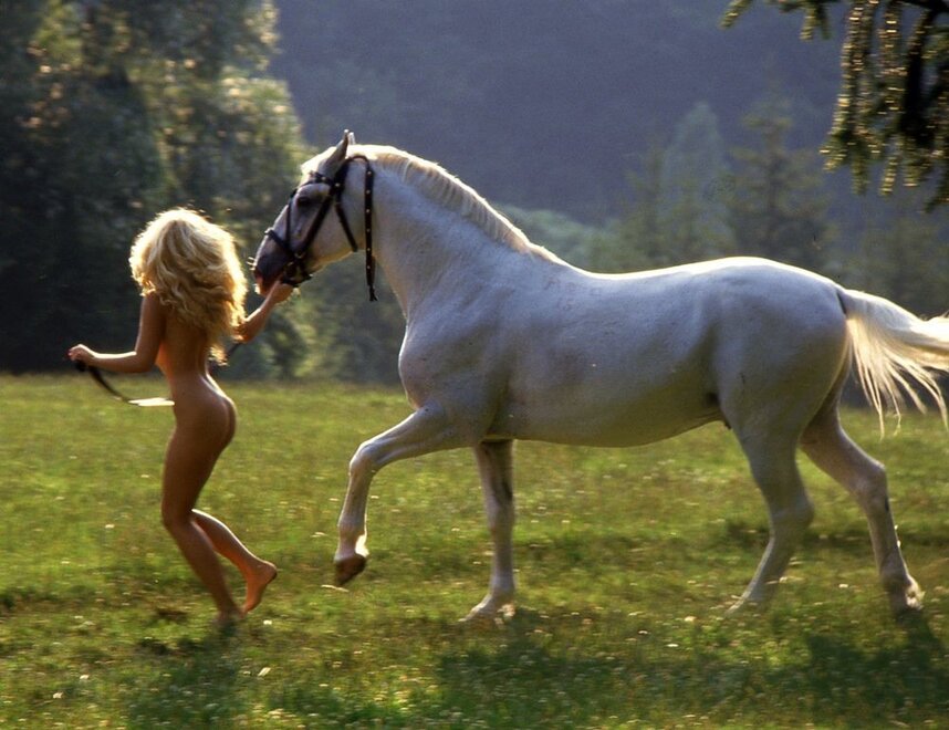 Running with her white horse