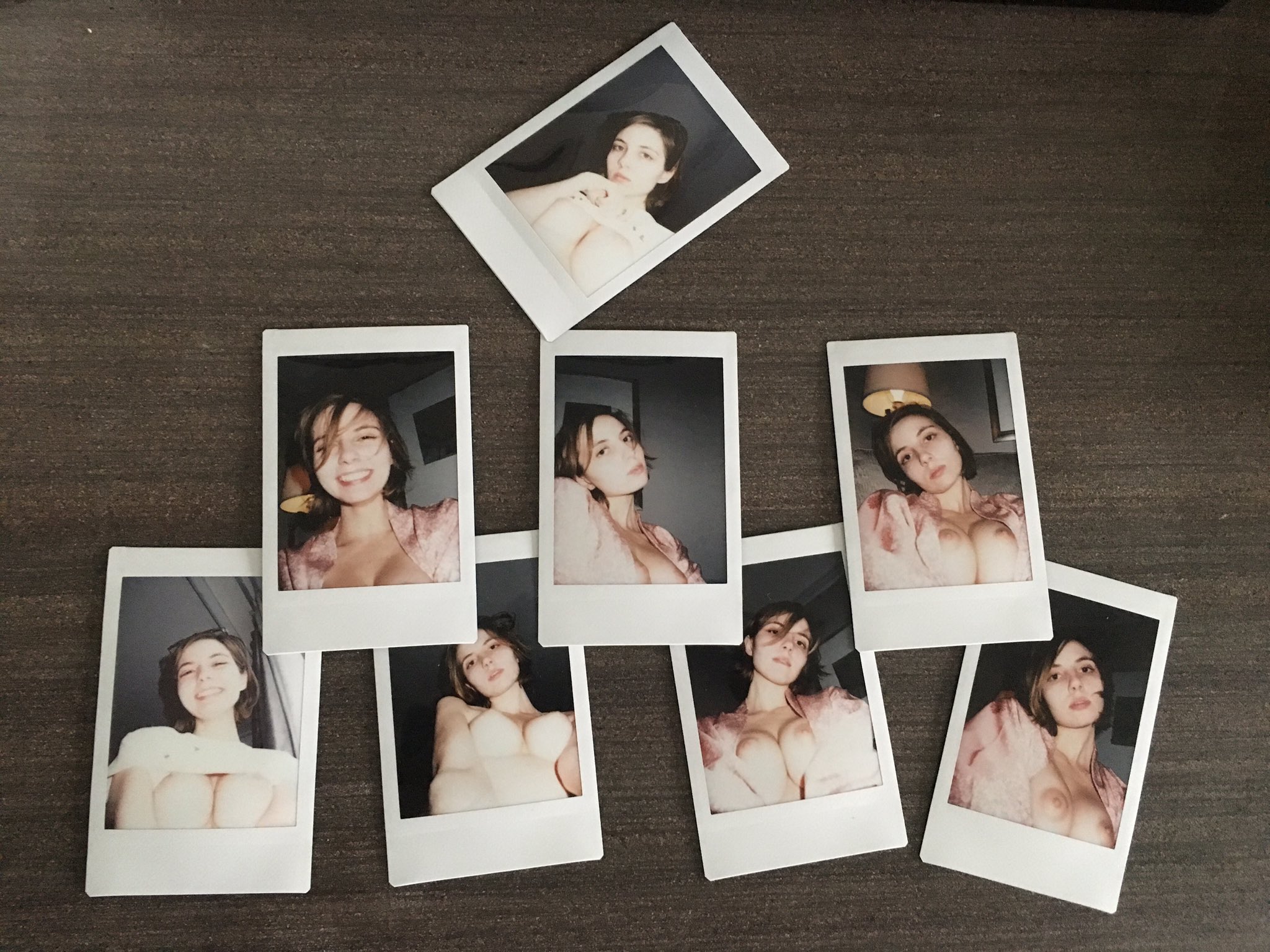 A pile of polaroids Porn Pic - EPORNER