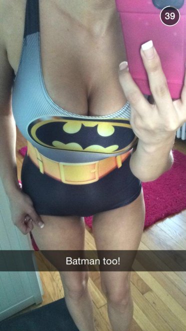 Batgirl bursting out of her swimsuit
