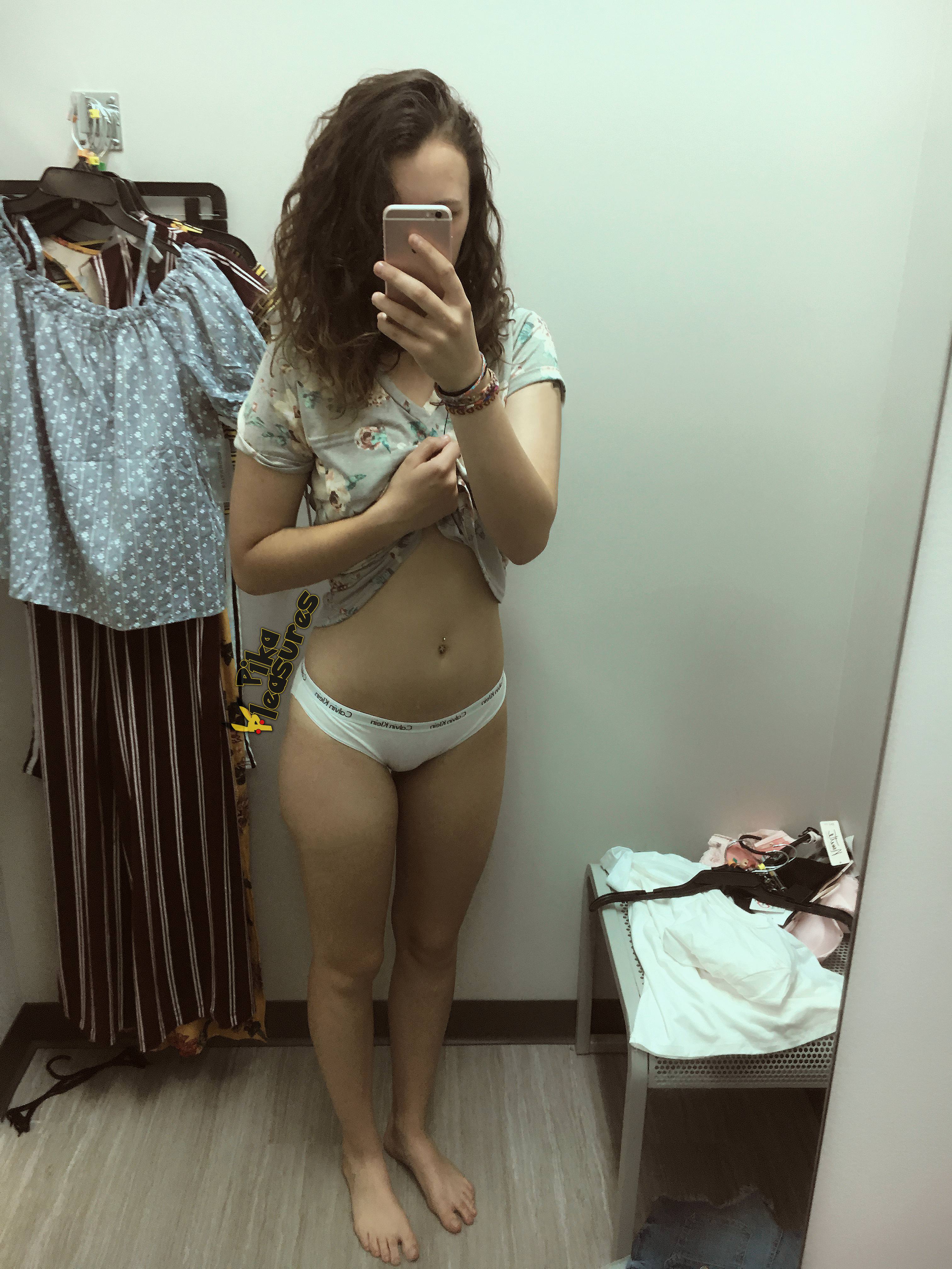 Amateur in dressing room tries on white undies showing tits