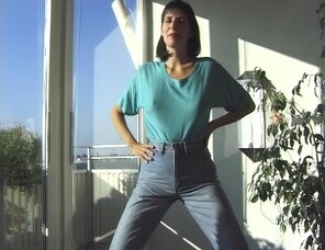 amateur photo Amateur porn actress Gabrielle Hannah in sexy jeans strips on a sunny day (7)