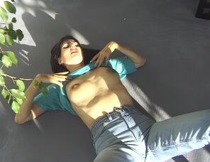 amateur photo Amateur porn actress Gabrielle Hannah in sexy jeans strips on a sunny day (37)