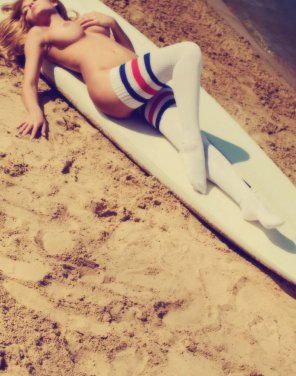 amateur photo Sexy striped socks on a surfer