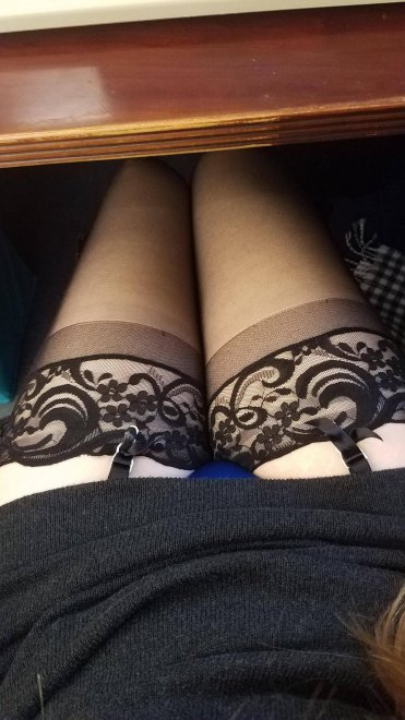 Pale thighs and black lace in my office