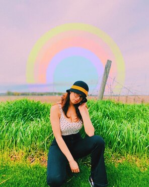 amateur photo Ava Taylor with a beautiful rainbow