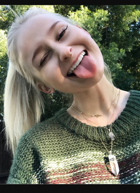 Super cute blonde with her tongue out