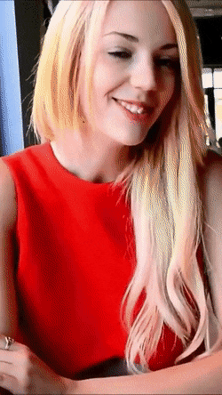 photo amateur Blonde in red dress almost caught flashing