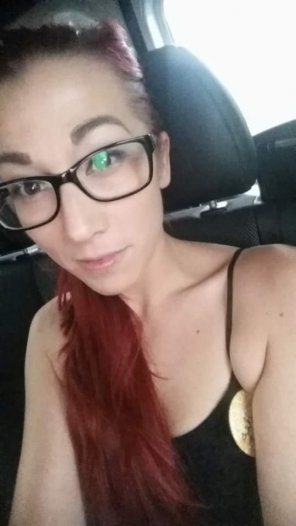 Sexy redhead nerd with glasses