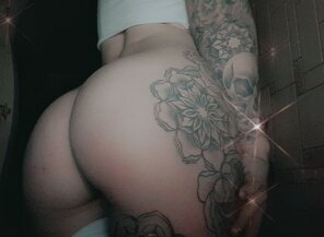 ass tattoo and sleeve