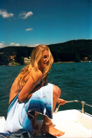 Happy and embarrassed on a boat