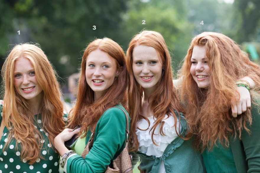 A gaggle of redheads in green