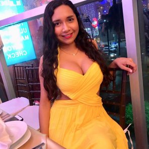 Big tits in yellow dress