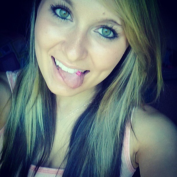 Gorgeous blonde with a tongue ring