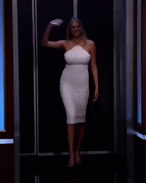 Kate Upton in a tight white dress