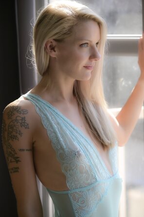 amateur photo Staring out of the window in turquoise bodysuit [f][oc]