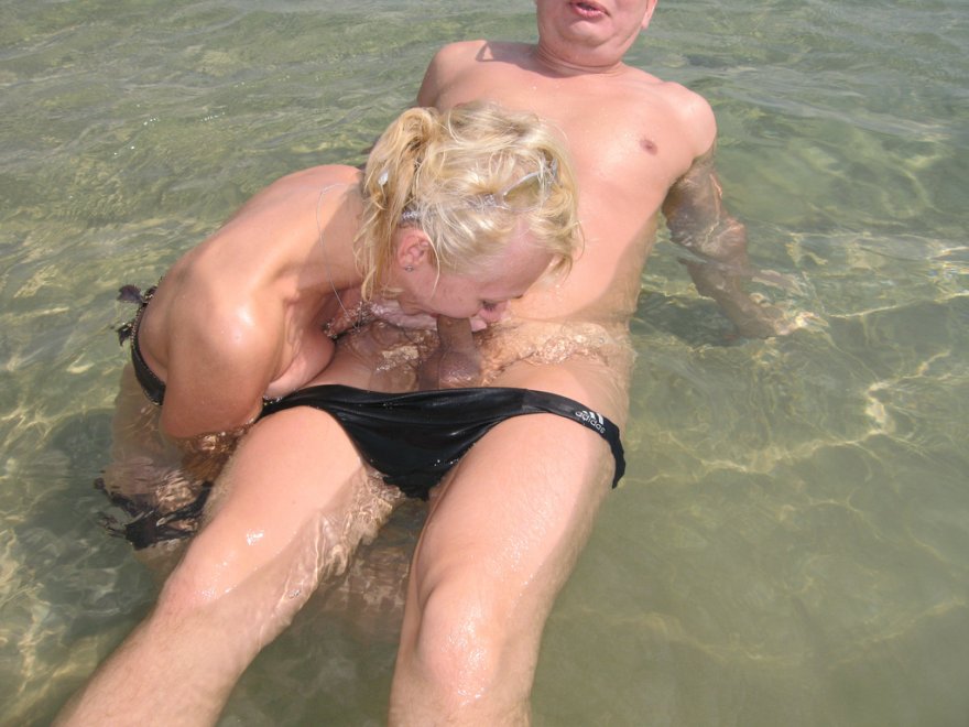 blond sucks cock on a public nude beach