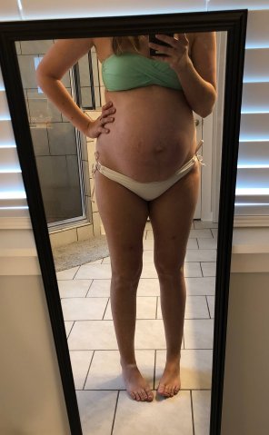 amateur photo Wife trying on bikinis for our beach trip! Should she take this one? #36weeks
