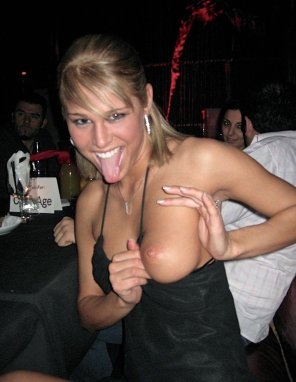 Flashing Her Titty