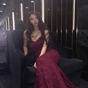 photo amateur Asian goddess in a red dress