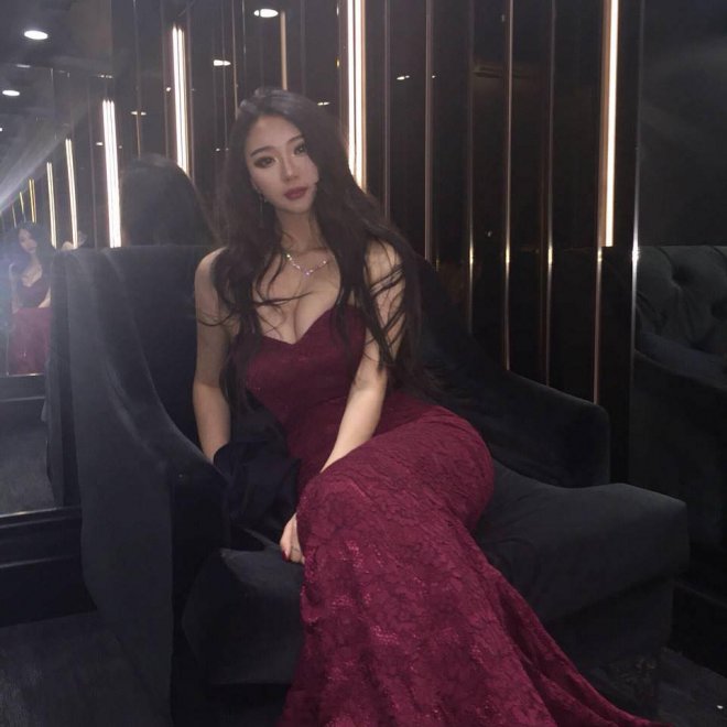 Asian goddess in a red dress