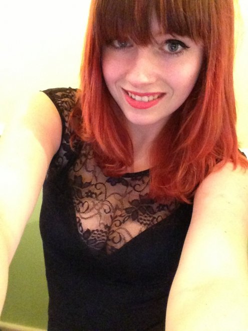 Who else likes redheads and lacy cleavage?