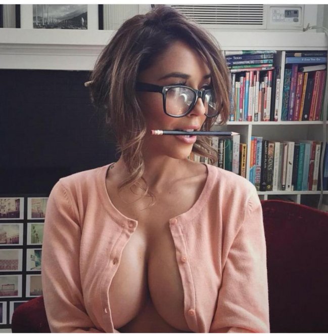 Sexy Sweater, Boobs and Glasses - She Has It All