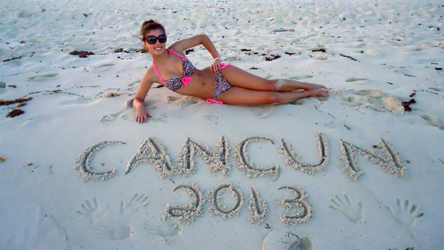 Cute brunette with a nice little bikini body who, apparently in 2013, went to Cancun