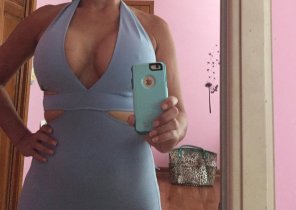 amateur pic Bursting out MILF in dress