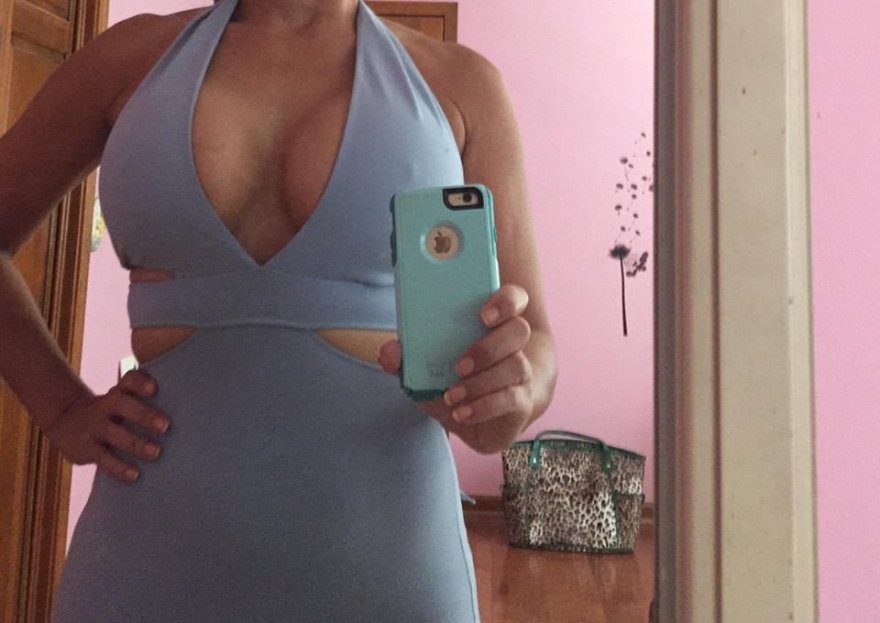 Bursting out MILF in dress