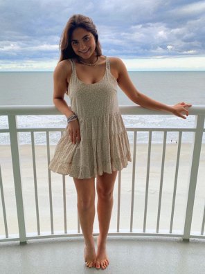 On the beach in a nice dress