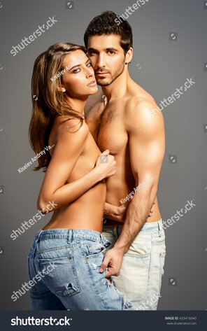 zdjęcie amatorskie stock-photo-beautiful-sexual-couple-topless-playing-in-love-games-jeans-style-studio-shot-433416040