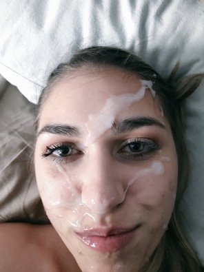 All over her face