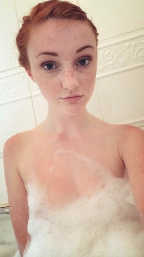 amateur photo tiny girl, dressed in suds