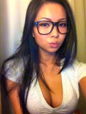 Bespectacled and busty