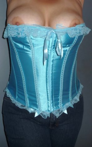 amateur pic out over her corset