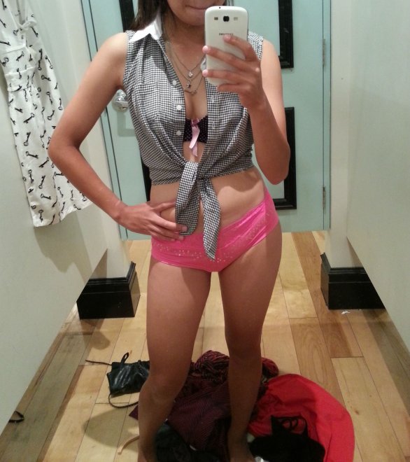 Sexy asian trying on panties. Hope she bought those!