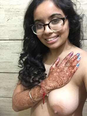 amateur photo [4â€™10] I guess I donâ€™t smile enough in my pics so hereâ€™s one of me smiling! I just got my mehndi done too.