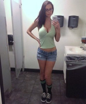 amateur photo Cleavage, glasses, shorts and striped socks....wow