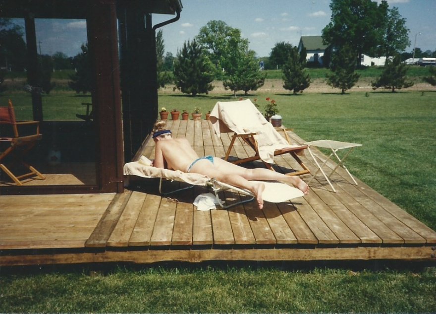 Reading and sunning, circa 1985...