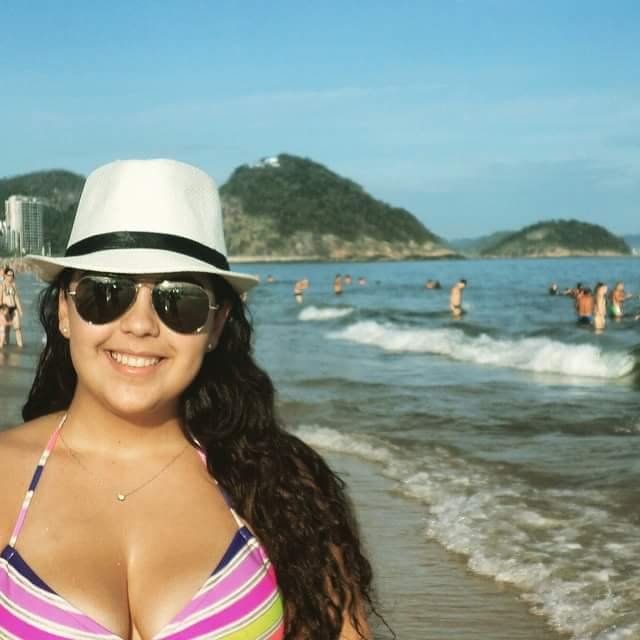 Busty brunette babe at beach in Brazil