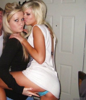 amateur photo Two drunk young blondes at the party fell in love with each other